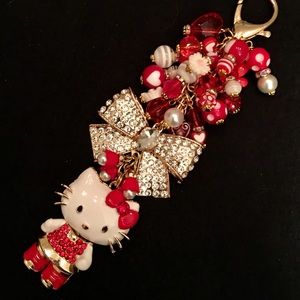 RED ENAMEL HI KITTY W/RHINESTONE BOW & DANGLES!